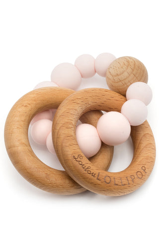BUBBLE SILICONE WOOD RATTLE-PINK QUARTZ