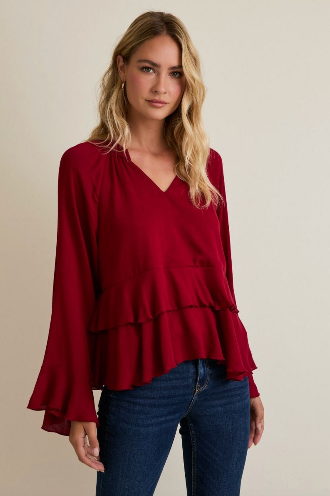 Notch Neck Long Sleeve Ruffle Hem Top