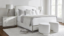 SILHOUETTE STAINLESS STEEL AND UPHOLSTERED BED